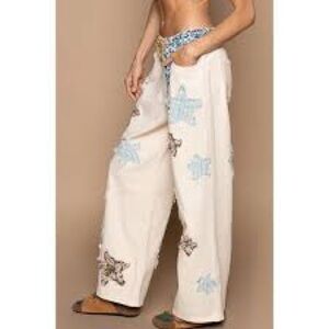 New POL Clothing Women's Cream Wide-Leg Pants with Blue and Brown Star Patchwork